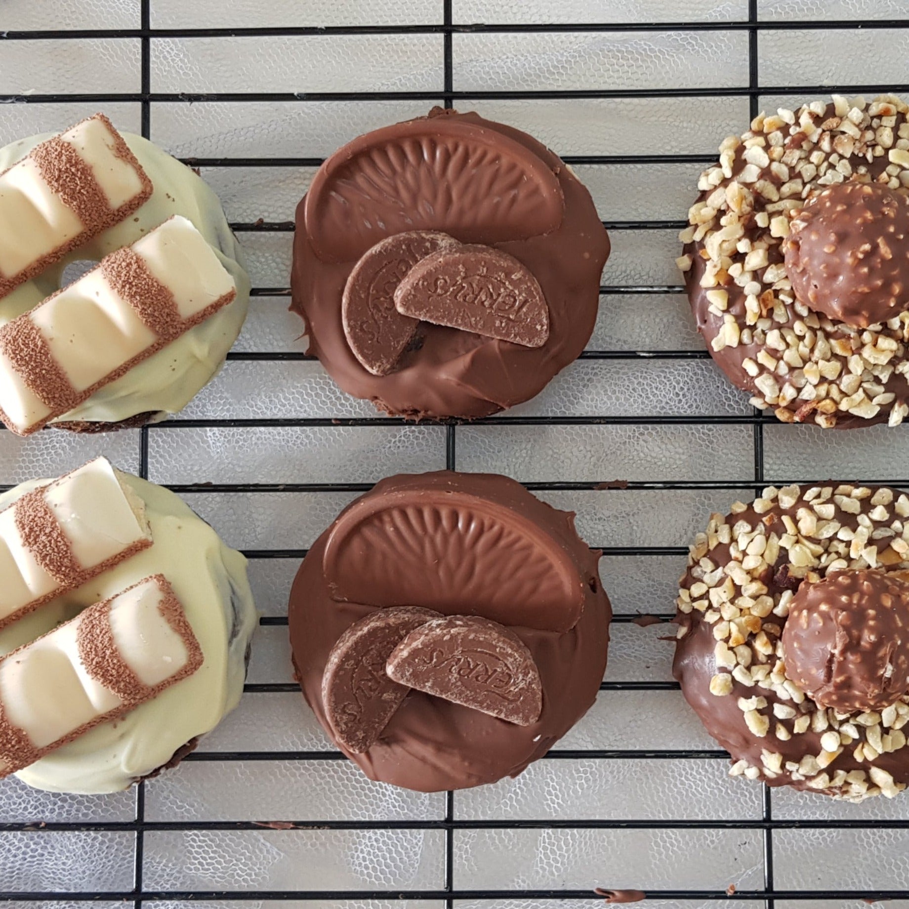 Bronuts with terry's chocolate orange, ferrero rocher and kinder bueno