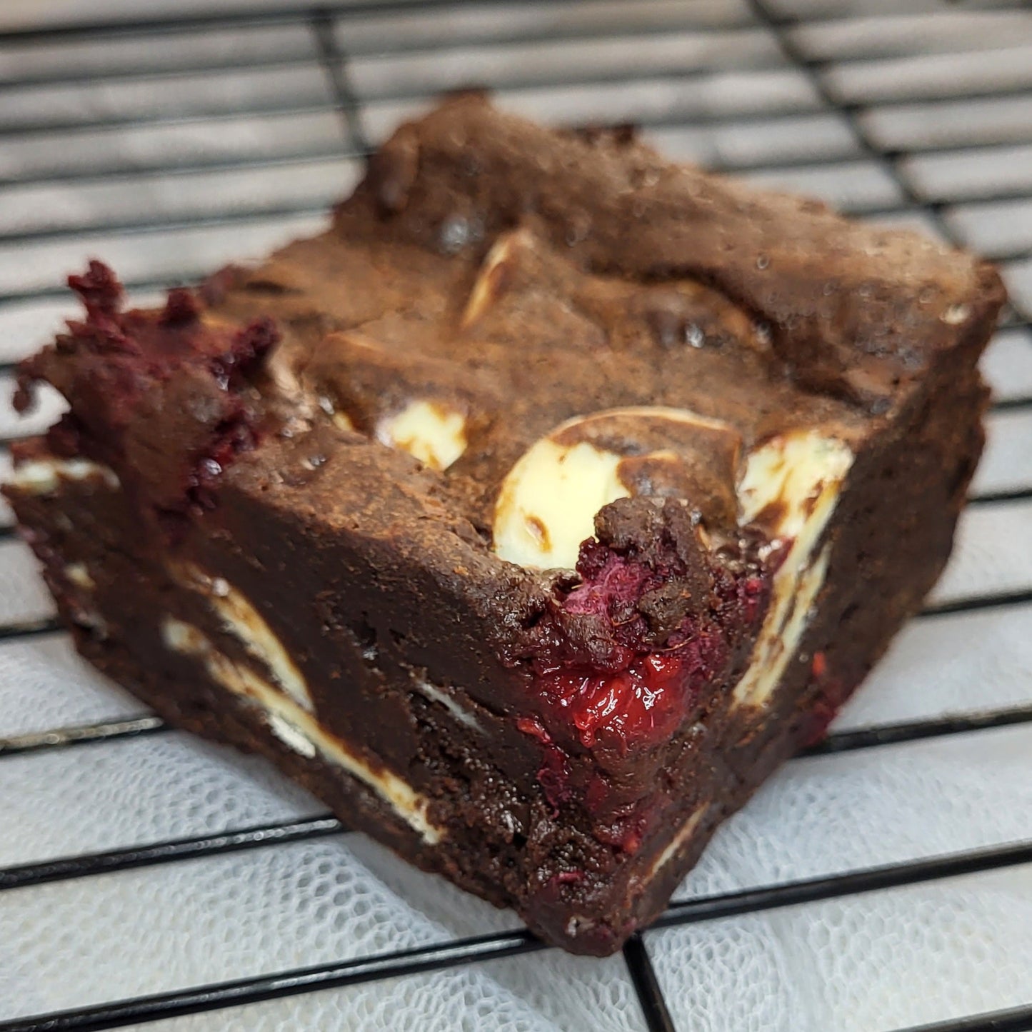 inside of a white chocolate and raspberry brownie
